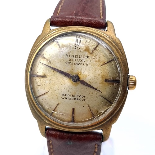 402 - A vintage Indure 17 jewel wrist watch, set with a baton dial and wide up mechanism. Watch in working... 