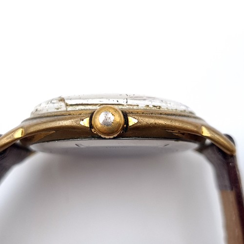 402 - A vintage Indure 17 jewel wrist watch, set with a baton dial and wide up mechanism. Watch in working... 