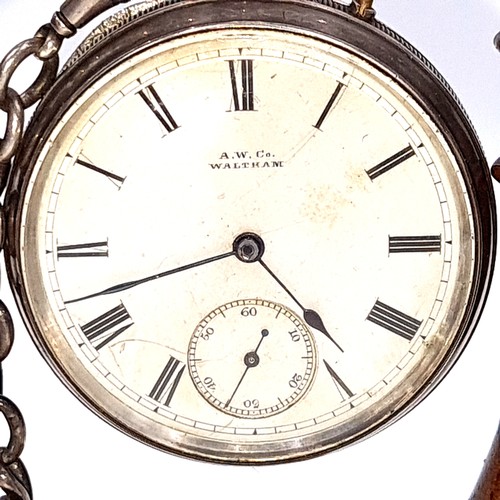 434 - Star Lot : A fine example of a Sterling Silver 1927 Waltham & Co pocket watch, set with white enamel... 