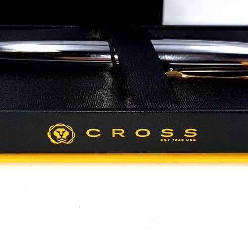 438 - A fine example of an as new brushed chrome Executive Cross ball point pen, encased in original gift ... 