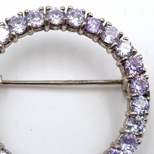 446 - A pretty example of a Sterling Silver wreath gem stone brooch, with original pin intact.