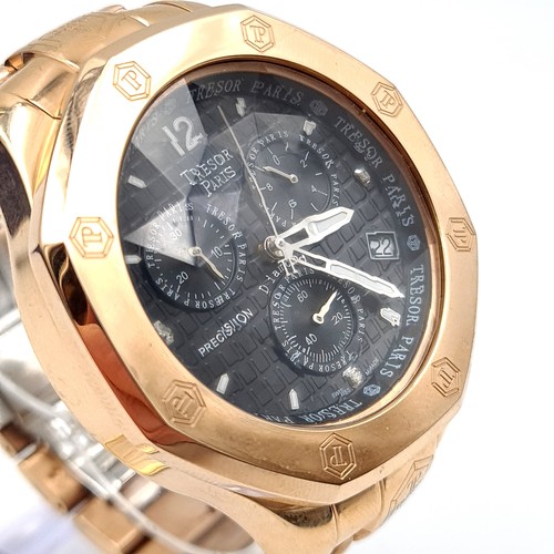 463 - A very heavy example of a Tresor 18 carat chronograph rose gold plated wrist watch, with stylish bla... 