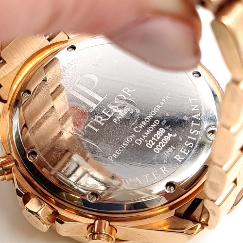 463 - A very heavy example of a Tresor 18 carat chronograph rose gold plated wrist watch, with stylish bla... 