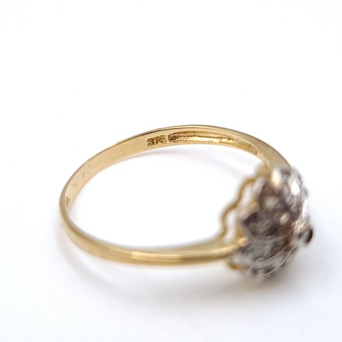 467 - A beautiful example of a floral art deco 9 carat gold Diamond ring, set in a cluster setting. Ring s... 