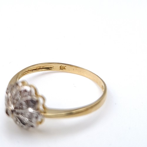 467 - A beautiful example of a floral art deco 9 carat gold Diamond ring, set in a cluster setting. Ring s... 