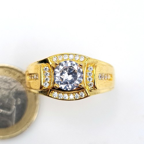 468 - An unusual sterling silver gilt solitaire ring, set with a gem stone. Ring size: Z. Weight: 6.63 gra... 