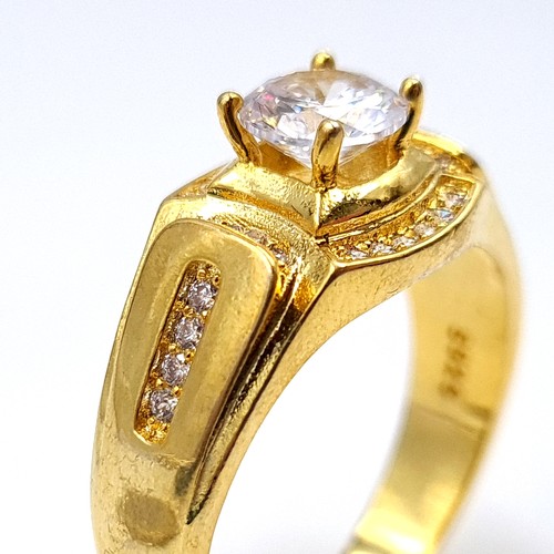 468 - An unusual sterling silver gilt solitaire ring, set with a gem stone. Ring size: Z. Weight: 6.63 gra... 