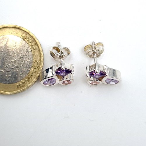 489 - A very pretty pair of sterling silver Amethyst and Tourmaline stone stud earrings. Old, new stock. N... 