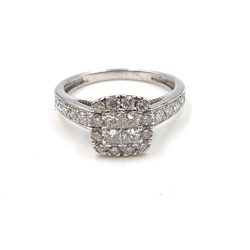 496 - Super Star Lot: An exquisite 9 carat White Gold Diamond cluster ring, featuring a square form which ... 