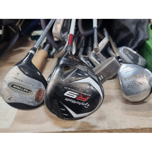 1050 - A very Good set of Clubs by Wilson Ultra 45 irons 3,4,5,6,7,9 PW  And a Wilson Staff putter and Tayl... 