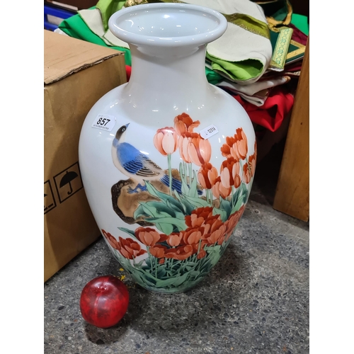 857 - A beautiful hand painted large Japanese vase depicting floral and bird detail.