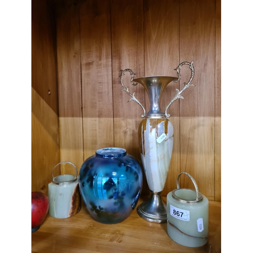 867 - A selection of four items including a fabulous onyx vase along with two matching tea light holders w... 