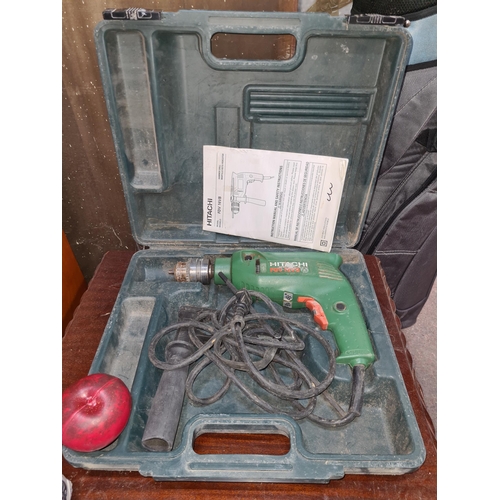 882 - A Hitachi FDV 16VB hammer drill with hard shell case and user manual. 110V  In excellent working ord... 