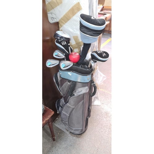 883 - A set of Masters graphite shaft golf clubs including driver, 3 wood, 24 and 21 degree woods, 9, 8 an... 