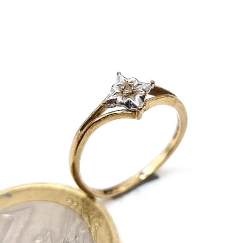 53 - A 9ct Gold Illusion Set Star Diamond Ring. Size H, weight 1.13 gms.