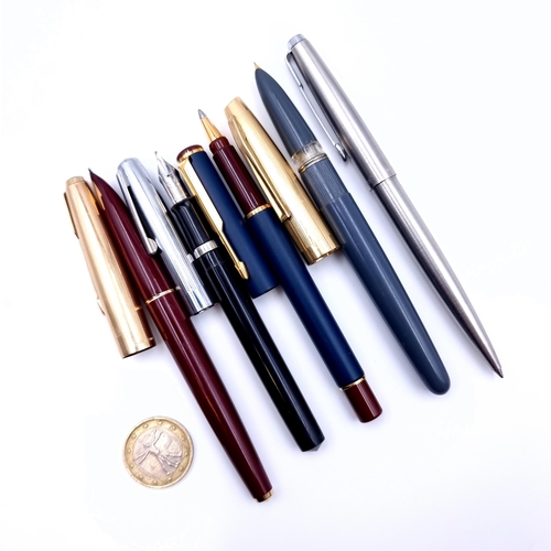 885 - A collection of five pens, which includes three fountain pens and two ball point pens. This collecti... 