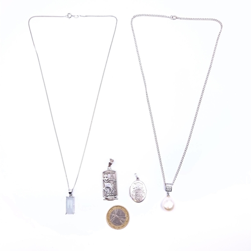 894 - A collection of sterling silver items, including two high quality pendant necklaces which includes a... 