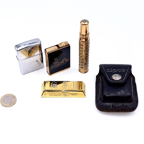 905 - A collection of four items including three lighters with Zippo, a Gold Original Fancy Goods and a Co... 