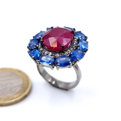 918 - Star Lot : A fabulous natural Ruby stone Ring of 10.55 cts set  with a fabulous Sapphire and Diamond... 