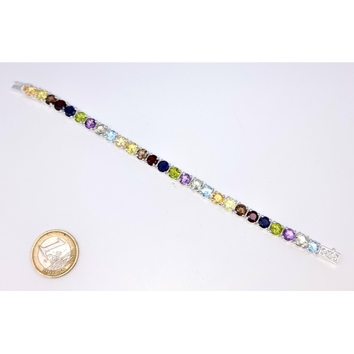 925 - Star Lot : A beautiful Multi Stone Line Bracelet of Amethyst, Peridot, Citrine and Topaz Stones, len... 