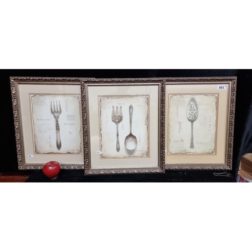 93 - Three Emily Adams fine art prints. Featuring antique kitchen forks and spoons. Housed in gilt frames... 