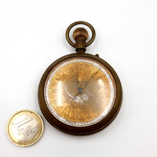 930 - An antique John Forrest brass mounted Gold Faced Roman numeral dialled Pocket Watch set with wind up... 