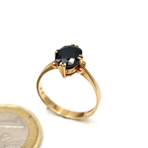 946 - Star Lot : An elegant 9ct Gold Ring set with a sapphire gemstone. Weight 2.39g. Size L. With present... 