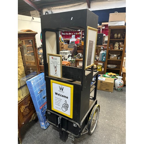 515 - Star Lot : A two wheel  mobile cocktail stand.  Includes slots for glasses.  An unusual item that co... 