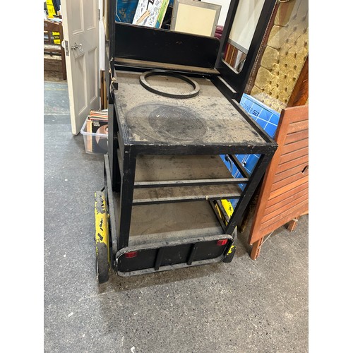 515 - Star Lot : A two wheel  mobile cocktail stand.  Includes slots for glasses.  An unusual item that co... 