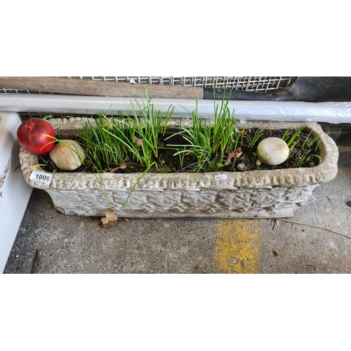 1006 - A large reconstituted stone box planter.