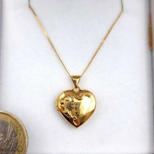 957 - A gorgeous 9ct Gold Necklace with a heart shaped locket pendant boasting a floral motif both with 37... 