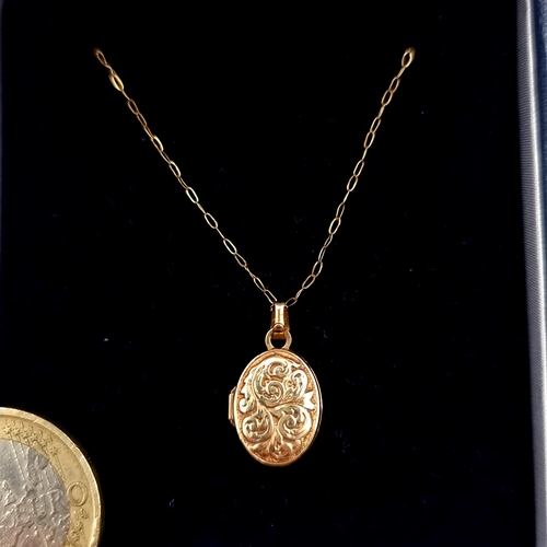 958 - A gorgeous 9ct Gold Necklace with an elaborate locket pendant boasting foliate motifs both with 9ct ... 