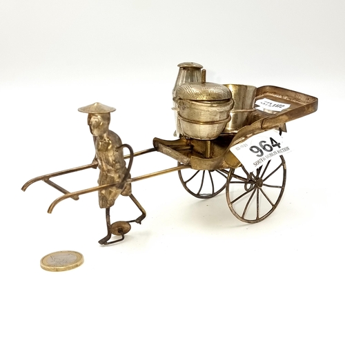 964 - A cunningly designed Rickshaw condiment holder. The set consists of the rickshaw with working wheels... 