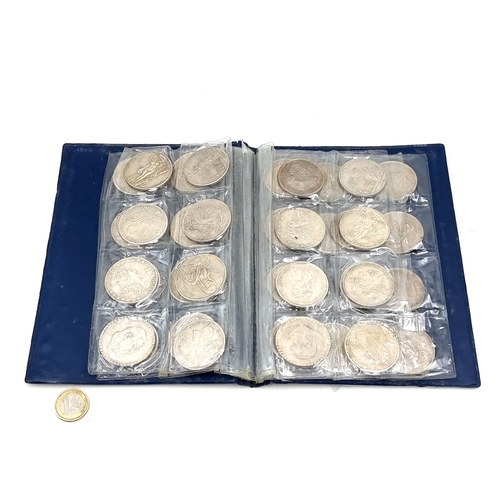 977 - A collection of reproduction valuable coins.