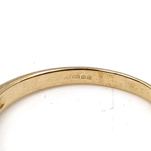 45 - A pretty 9ct gold, 5 stone half Eternity Ring, hallmarked Birmingham 2006. Size O, weight 2gms.
