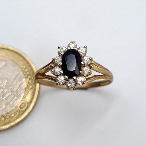48 - Star Lot : A pretty 9ct gold Sapphire Stone Ring set with a gemstone surround. Ring size N, weight 1... 