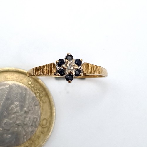52 - A very pretty 9ct Sapphire and  Diamond Ring, Size N.