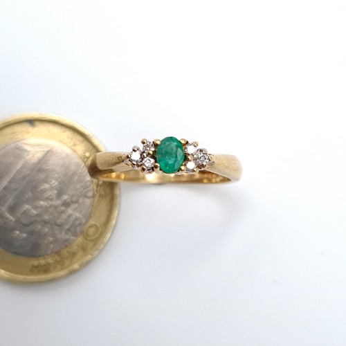 888 - Star Lot : A fabulous example of a vintage Emerald and Diamond 9 carat gold ring, this example featu... 