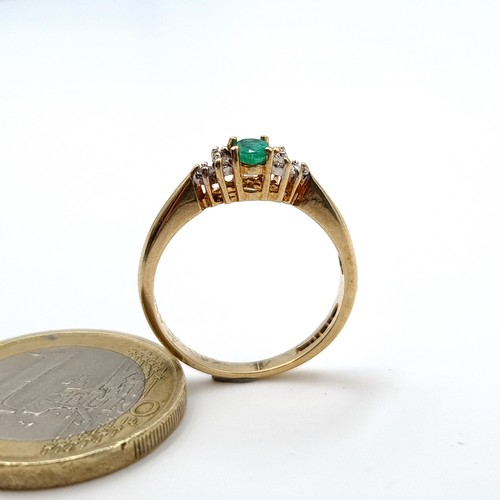 888 - Star Lot : A fabulous example of a vintage Emerald and Diamond 9 carat gold ring, this example featu... 