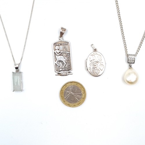 894 - A collection of sterling silver items, including two high quality pendant necklaces which includes a... 