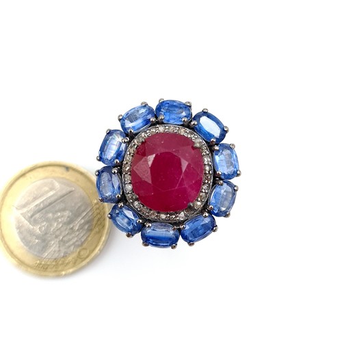 918 - Star Lot : A fabulous natural Ruby stone Ring of 10.55 cts set  with a fabulous Sapphire and Diamond... 