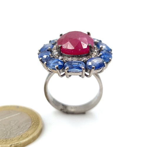 918 - Star Lot : A fabulous natural Ruby stone Ring of 10.55 cts set  with a fabulous Sapphire and Diamond... 