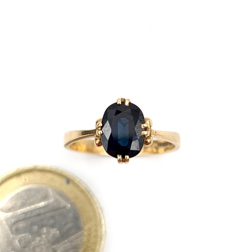 946 - Star Lot : An elegant 9ct Gold Ring set with a sapphire gemstone. Weight 2.39g. Size L. With present... 