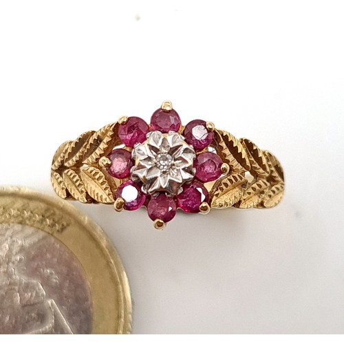 949 - Star Lot : A stunning 9ct Gold Ring with a gorgeous floral design set with diamonds and featuring a ... 