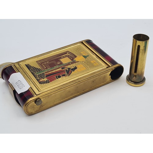 939 - A striking 20th century vanity compact comprising of a manicure set with scissors, file and cuticle ... 