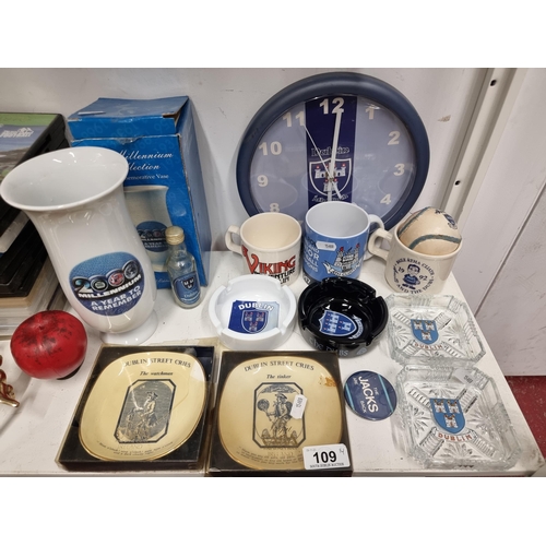 109 - Fourteen Dublin themed items including a Carrigdhoun Pottery Viking Adventure Dublin mug, ashtrays w... 