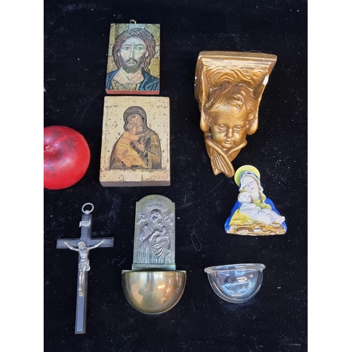 132 - Seven items of ecclesiastical item including Holy Water fonts, Mary and Christ on wooden panels and ... 