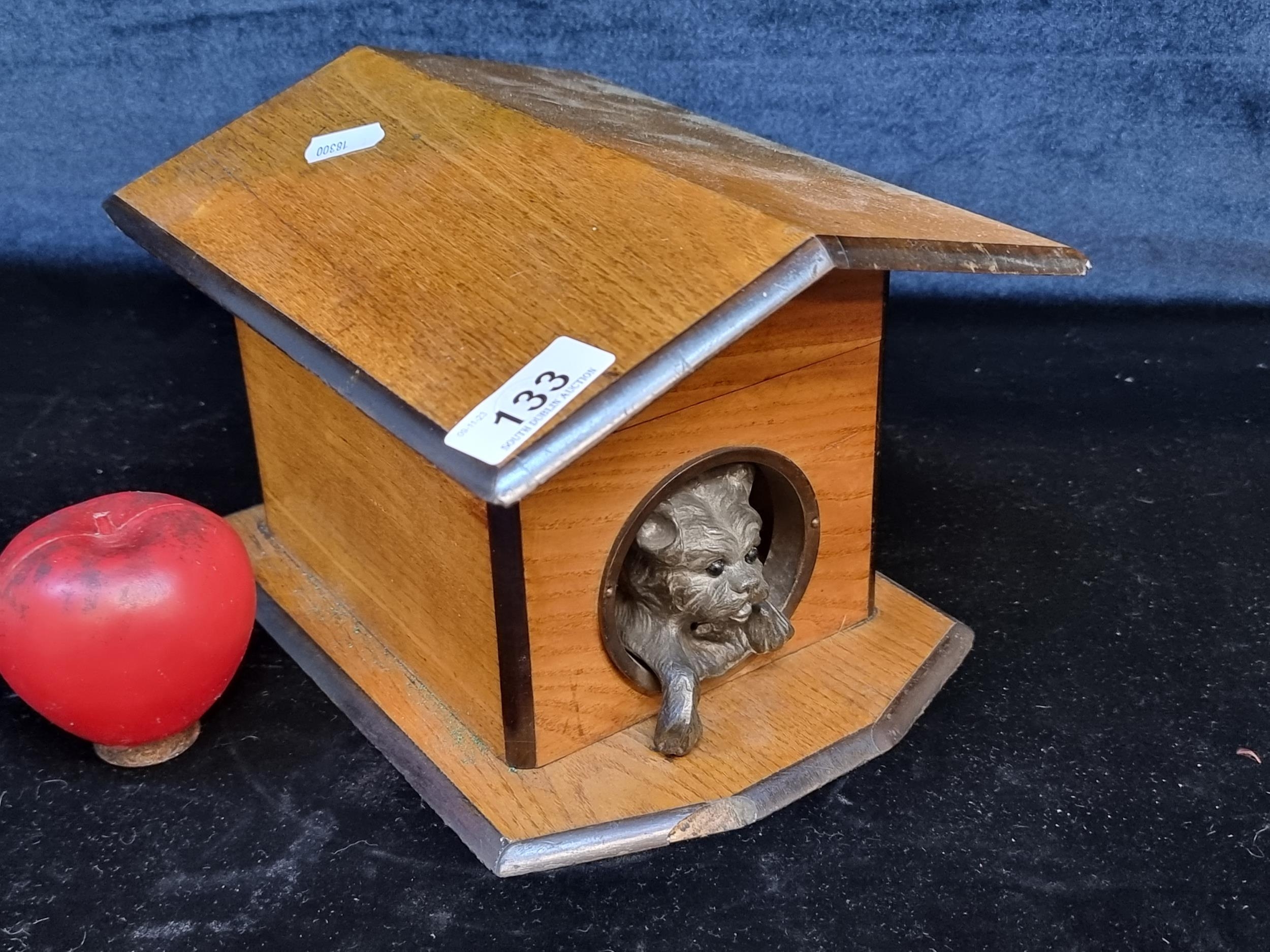 A wooden dog kennel box tea caddy with adorable dog to front lid