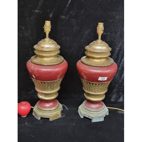 159 - A large pair of neo classical style Falkenstein German table lamps with brass and bronze features an... 