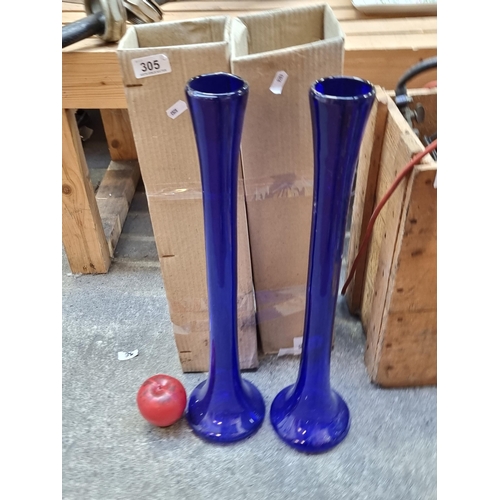 305 - Two fabulous as new tall bright cobalt glass vases, each set with elongated stems and bulbus bodies.... 